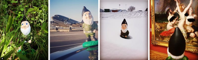 Four pictures of a bearded gnome in a navy hat and camo green jacket. The gnome is: sat amongst grass and leaves, on a car bonnet with a plane on a runway in the background, in snow, and finally looking at art in a gallery.