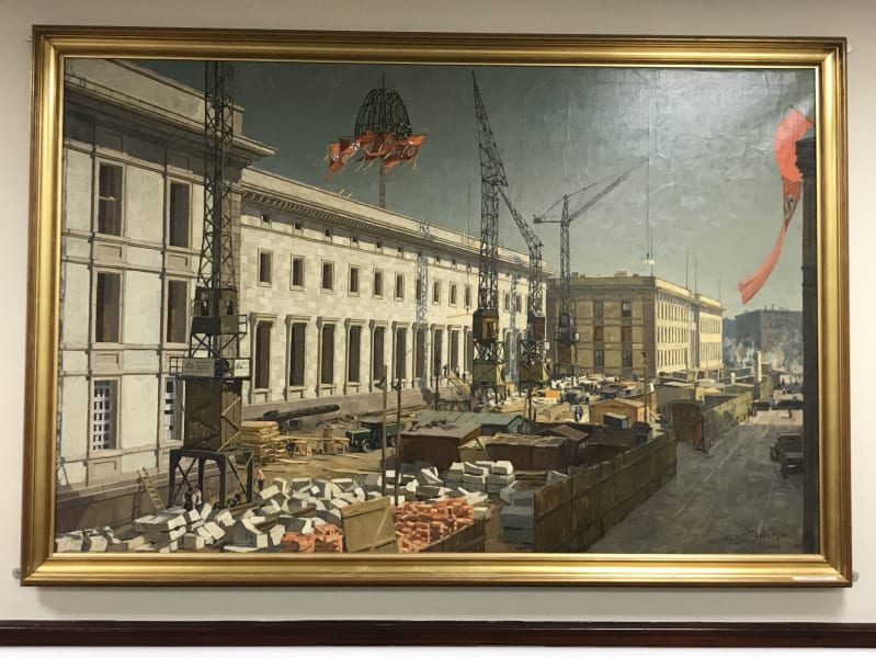 Painting of the Reich Chancellery being constructed in a gold frame.