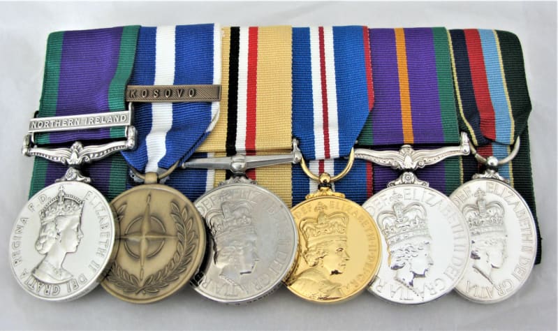A medal bar with six medals.