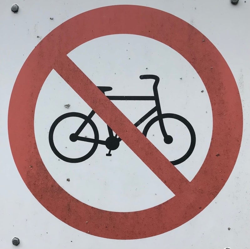 No bikes sign: icon of bike surrounded by red circle with a line running through diagonally.