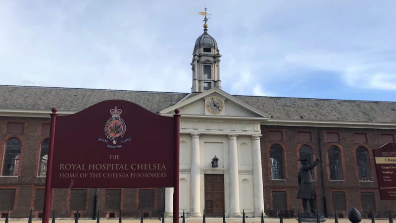 Photo of the Royal Hospital Chelsea. Sign reads Royal Hospital Chelsea. Photo is of the chapel