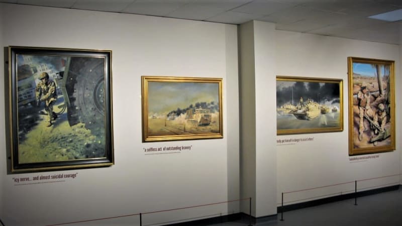 The four paintings as displayed in the Museum's Remembrance gallery.